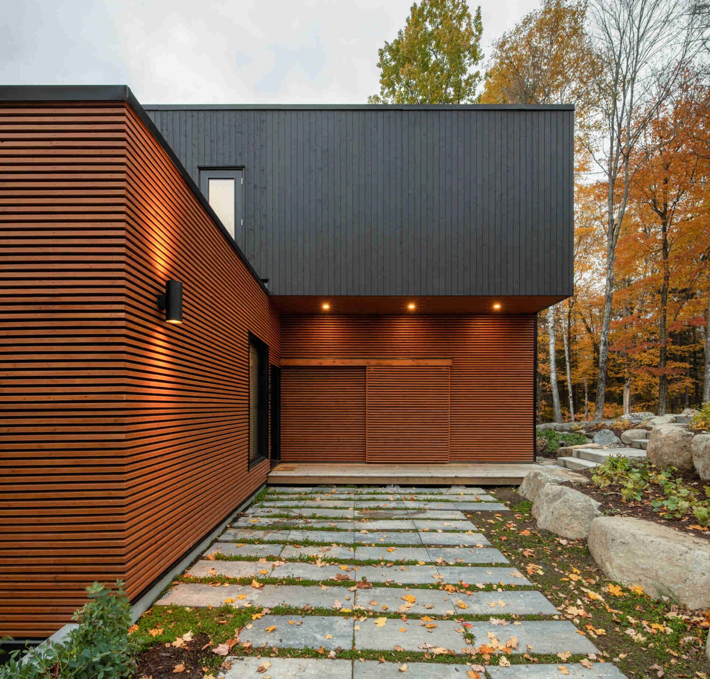 Illustrative reference of a weathered steel and timber residence